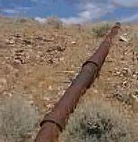 Section of pipe from the water siphon system that is used to feed a very scarce local water supply in Virginia City.